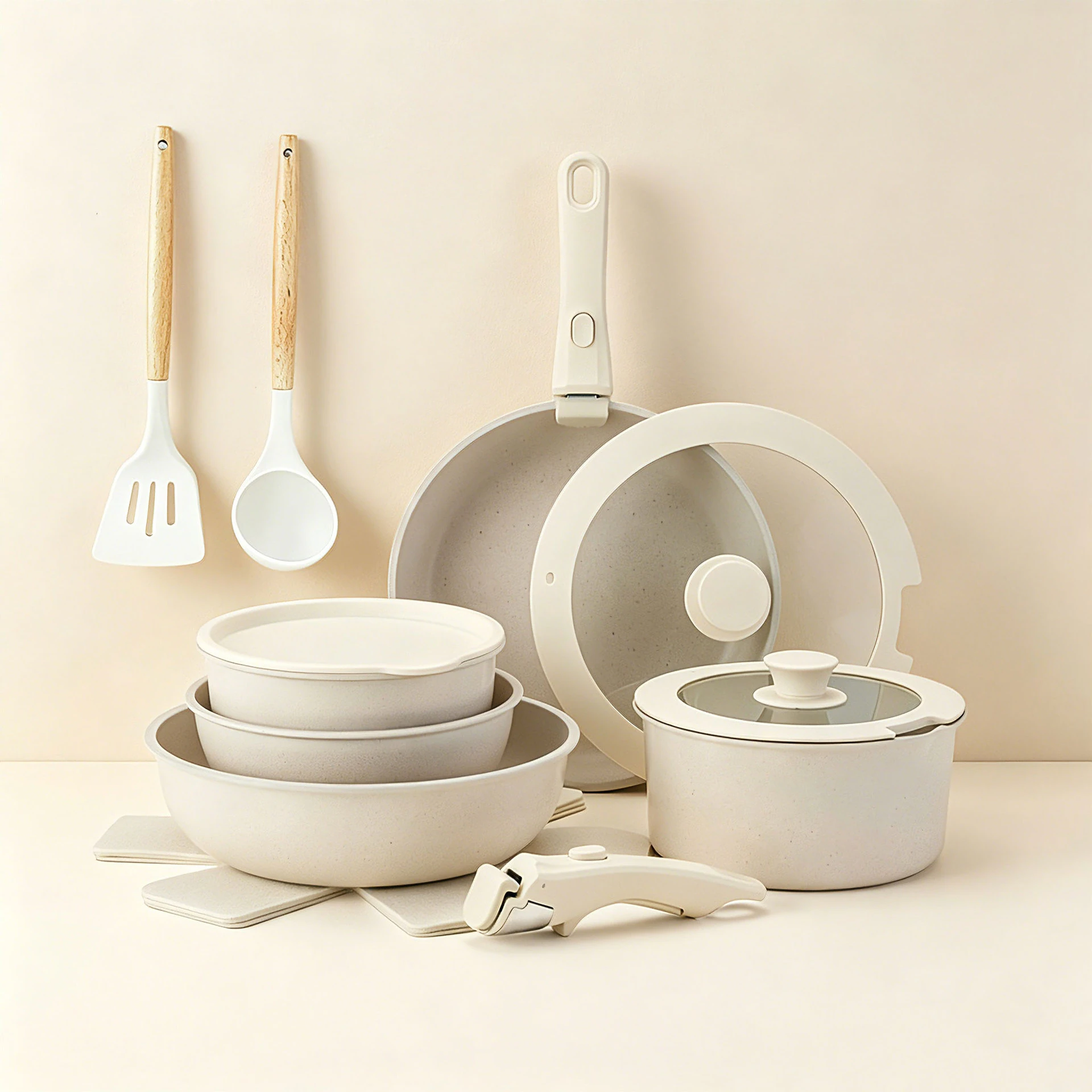 Ivory cookware collection with detachable handles, glass lids and utensils