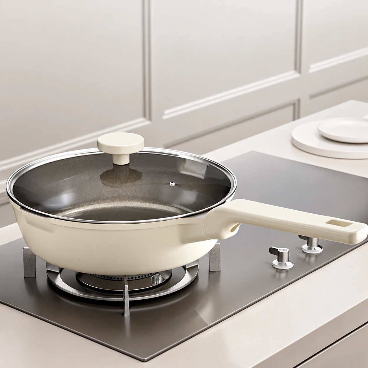 Ivory pan with lid on a hob