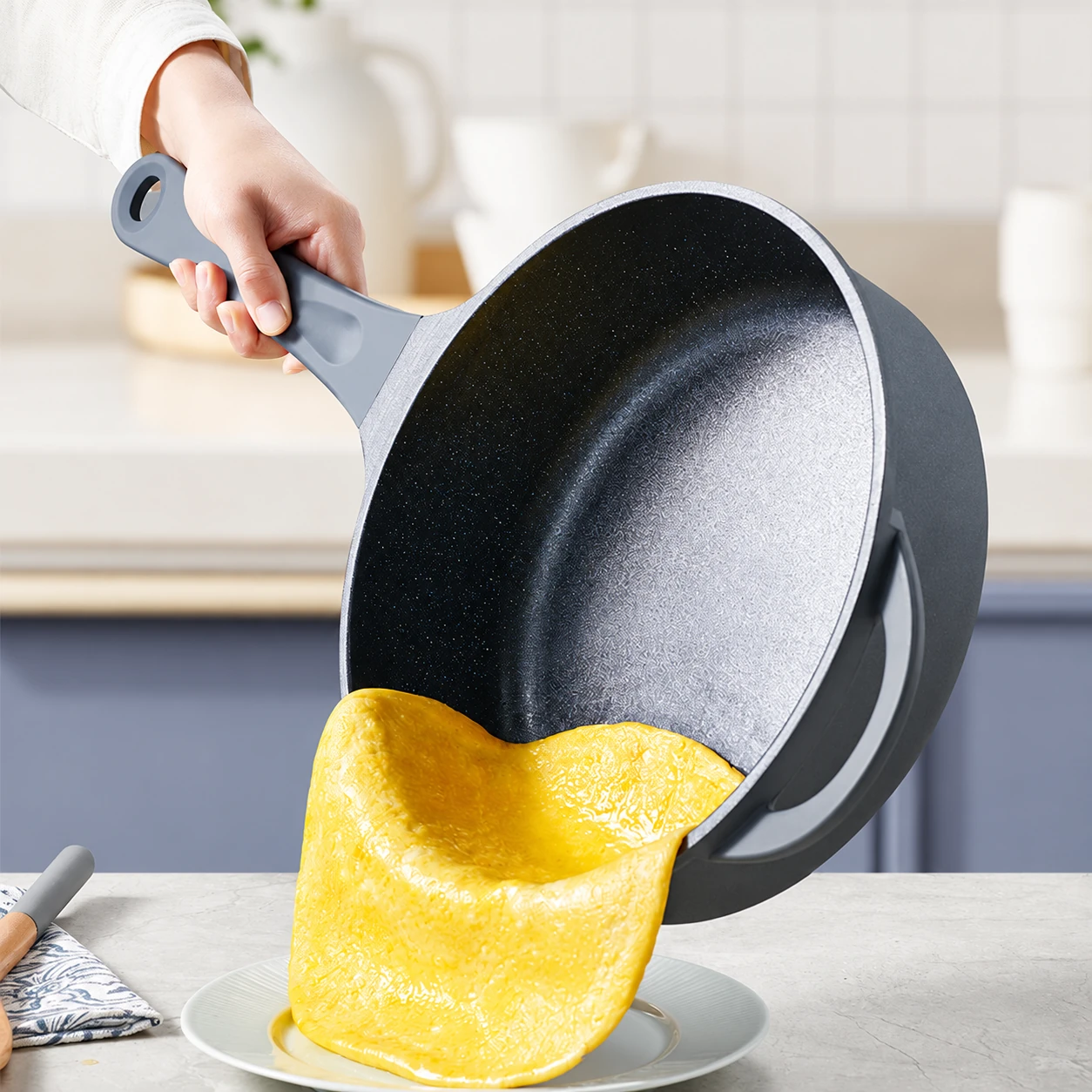 Blue frying pan in use